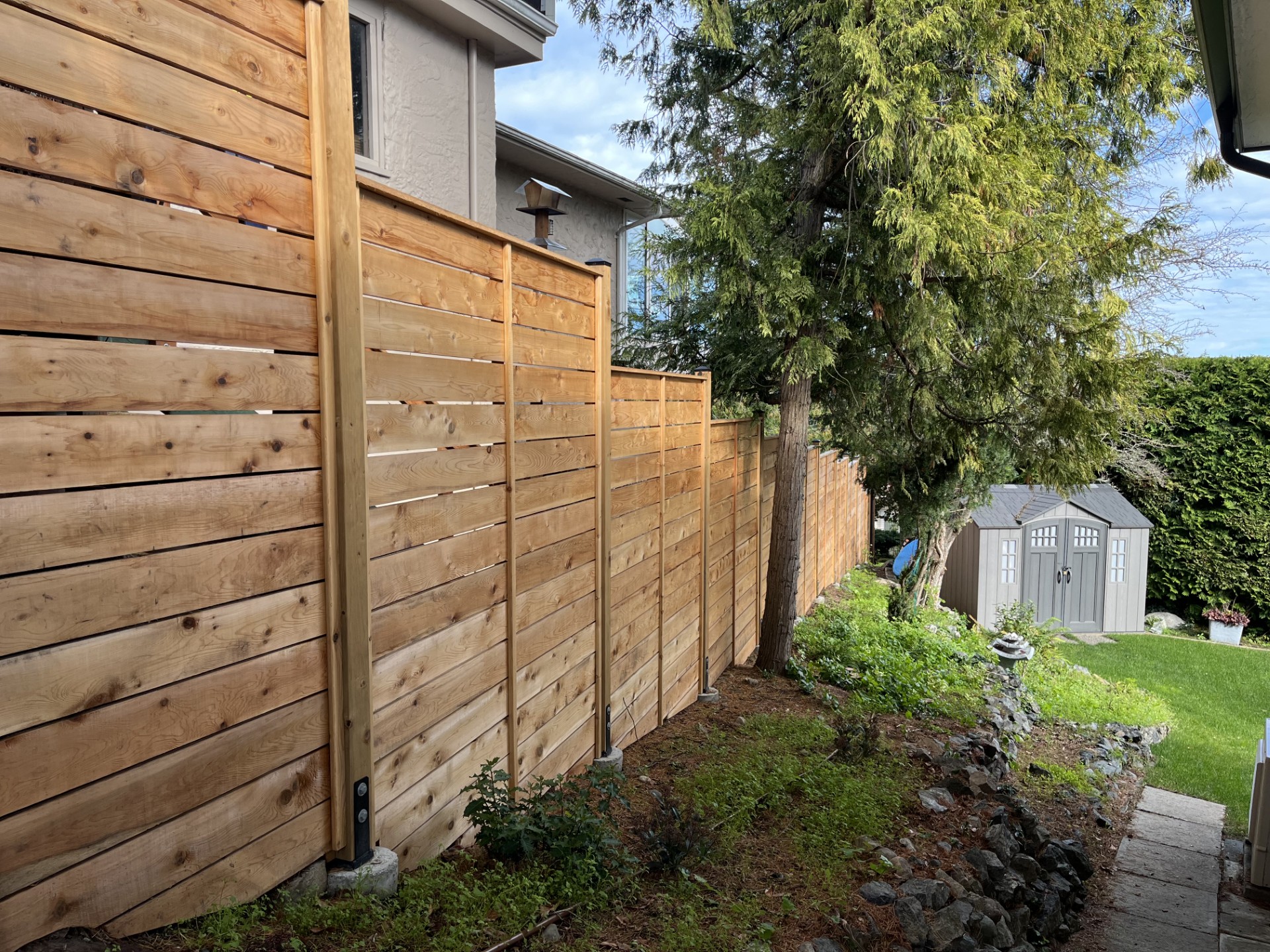Modern horizontal slat fence